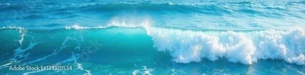 Fototapeta Ocean surface with wavy blue water and white foam in sunlight , waves, surf