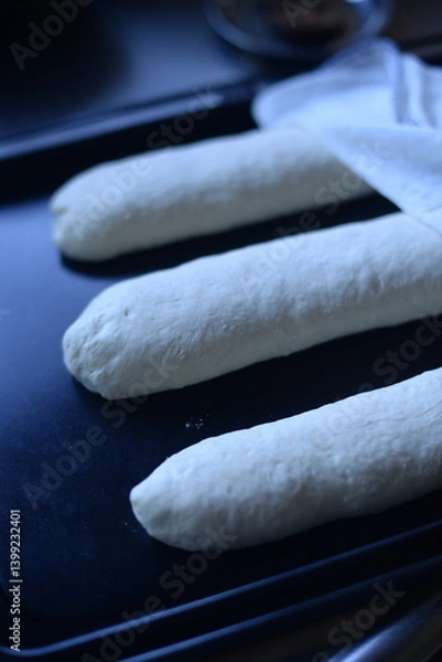 Fototapeta Baking homemade baguette is a relaxing time for me.