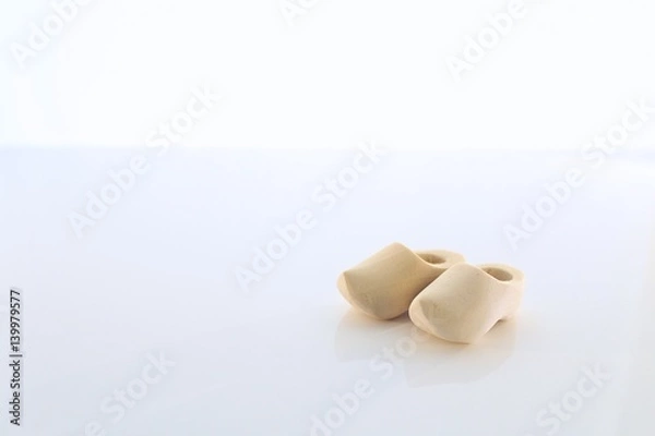Obraz Pair of Dutch Wooden Shoes with a White Background