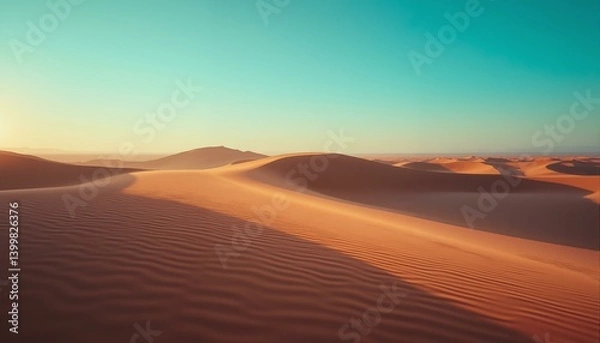 Fototapeta Ochre dunes ripple under a turquoise sky; rose, lavender shadows create ancient solitude.