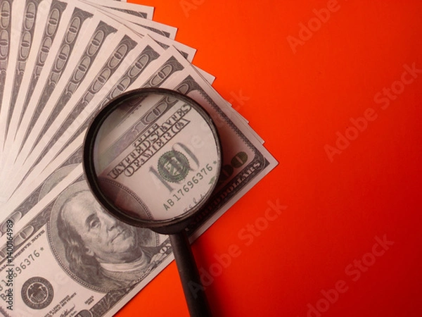 Obraz Closeup magnifying glass on a one hundred dollars