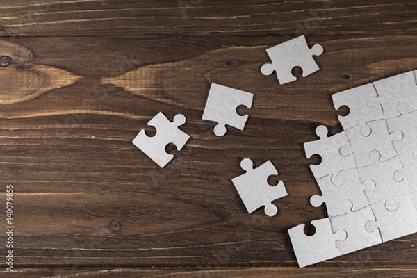Obraz Paper puzzles on a floor