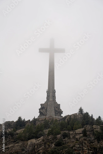 Fototapeta Foggy View of the Valle de los Caídos with Majestic Cross