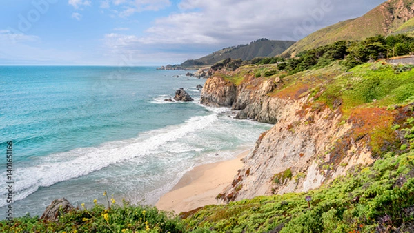 Fototapeta Big Sur, California, boasts a dramatic and rugged coastline, where the Santa Lucia Mountains plunge into the Pacific Ocean. The Pacific Coast Highway (Highway 1) winds along the rugged coast line