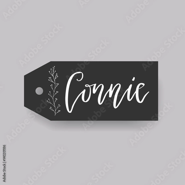 Fototapeta Common female first name Connie on a tag. Hand drawn calligraphy. Wedding typography element.