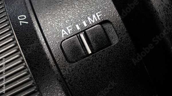 Fototapeta Closeup of the focus window on the camera lens. Close-up of the AF switch on the camera lens.