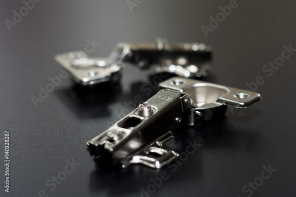 Obraz Door Hinge isolated on black background