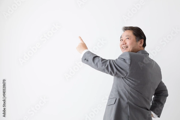 Obraz 指をさすビジネスマン、中年男性