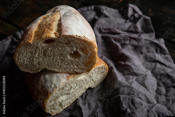 Obraz Fresh bread on a wooden table