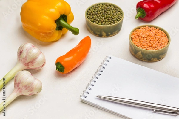 Obraz Pen and notebook. Bulgur and chickpeas in bowls.