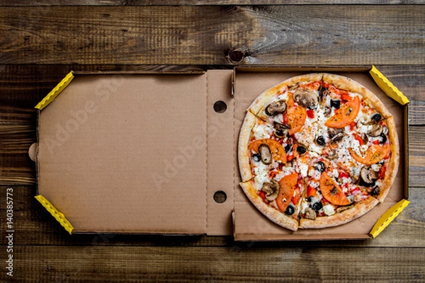 Fototapeta pizza in the in delivery box you can put your writing on the box