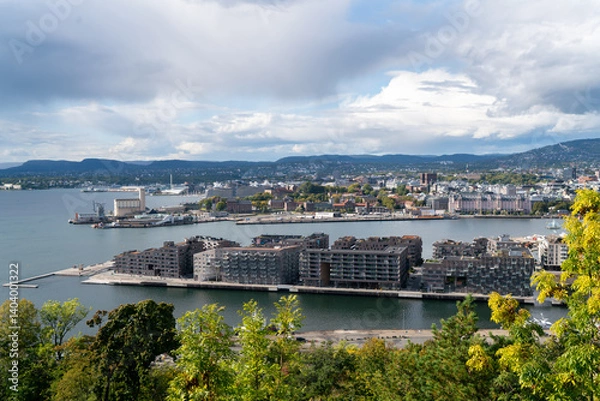 Fototapeta Lively Oslo Cityscape  with Clouds and Harbor Activities in UHD
