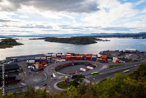 Fototapeta Fast-Paced  at Oslo Container Port with Trucks and Cranes in Action