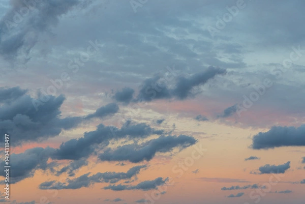 Fototapeta Cloudy sunset sky with a bit of colour.