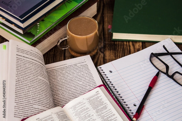 Fototapeta bible study stack of books notepad glasses