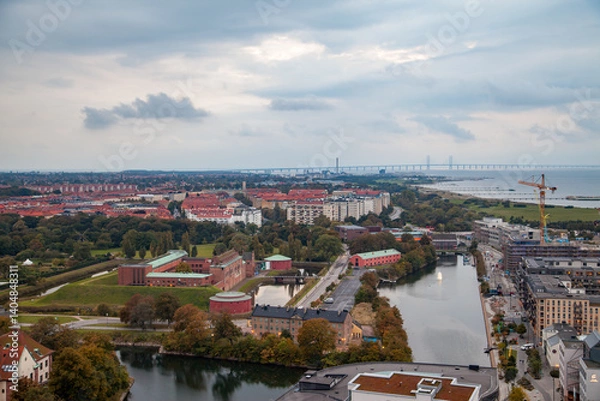 Fototapeta Dynamic Cityscape of Malmo Aerial Shot with Clouds at Dusk