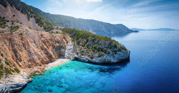 Obraz The remote west coast of Alonissos island, Sporades, Greece, with steep cliffs and emerald sea