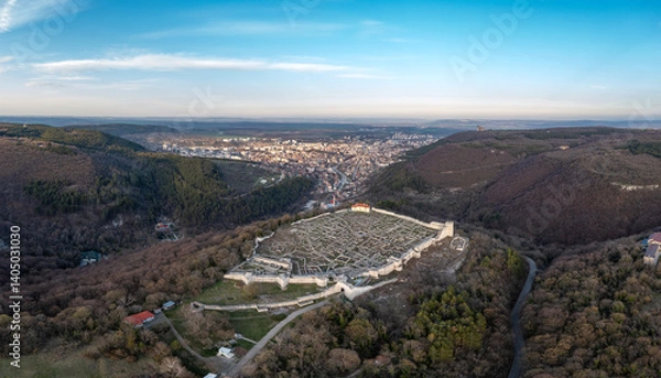 Fototapeta Aerial view ancient fortress from 8th century on top of a hill and city Shumen, Bulgaria
