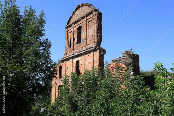 Fototapeta Photo with a view of the remains of the wall with the windows of Koretsky Castle surrounded by green spaces in Korets, Rivne region of Ukraine