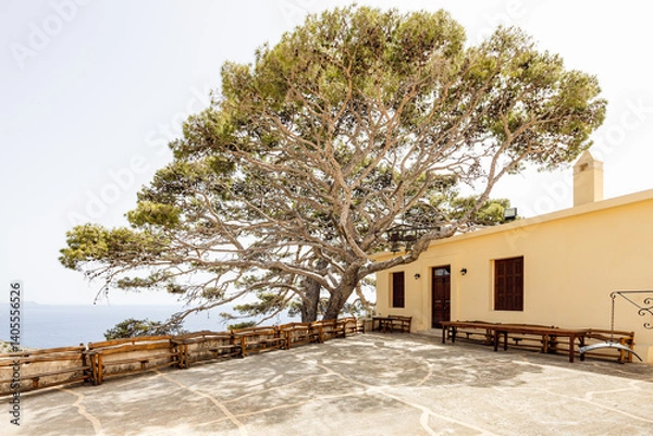 Fototapeta Tree with two bells at church at Monastery of St. John the Theologian, known as Monastery of Preveli (rebuilt in 1878). Crete, Greece.
