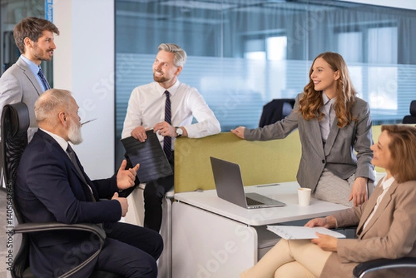 Obraz Business team discussing together business plans in office.