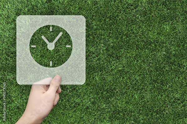 Obraz Clock symbol message box with green grass background