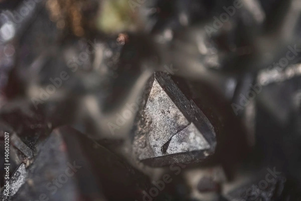 Fototapeta Mineral Cuprite (red copper ore) and silver crystals. Microphotography with high magnification- photo scale 10X