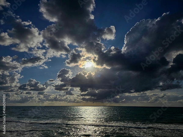 Obraz Dramatic Sunset Over the Ocean with Moody Clouds