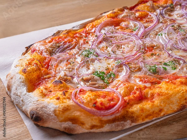 Obraz Pizza Cipolla. Italian pizza from a stove with tomato sauce red onions and Mozarella. Pizza on a wooden board