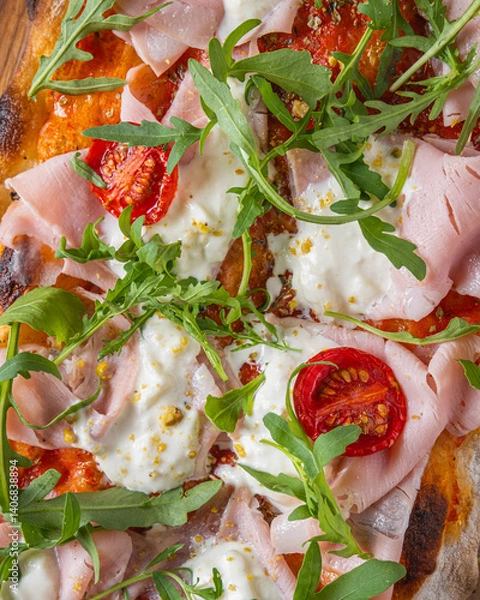 Obraz Italian pizza with mozzarely and dilapidated muzzle with a pistachio on a wooden board. Close angle of all pizza ingredients