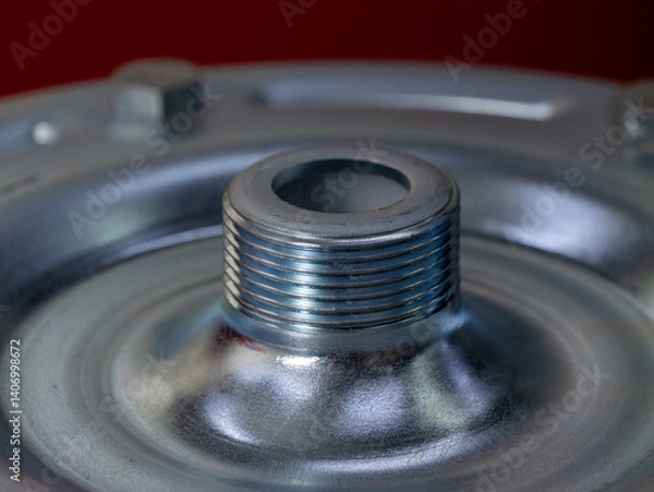 Fototapeta A silver object with a hole in the middle