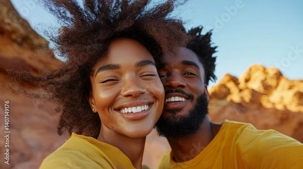 Obraz "A couple sharing a joyful moment outdoors at sunset."