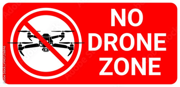 Fototapeta A bold red sign with a prohibition symbol over a drone icon, clearly marking a "No Drone Zone." Ideal for safety, security, or restricted-area signage