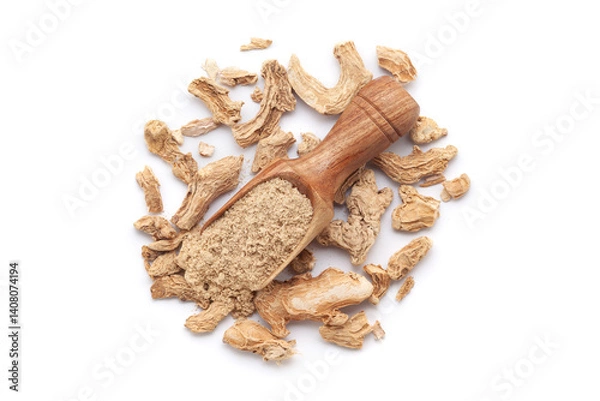 Obraz A wooden scoop filled with organic dry Ginger root (Zingiber officinale) or sonth powder, placed on a heap of ginger roots, isolated on a white background.