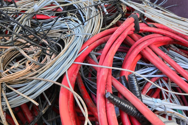 Obraz used electric cables collected in the recycling center for the reuse of recyclable material