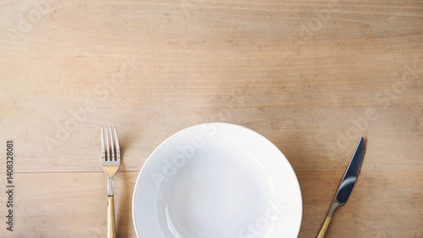 Obraz Empty plate, fork and knife on table