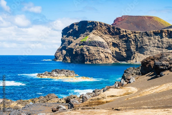 Fototapeta Stunning view of Capelinhos peninsula volcanic ocean coast and cliffs, Faial island, Azores, Portugal