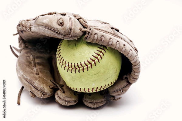 Fototapeta Ball inside old glove