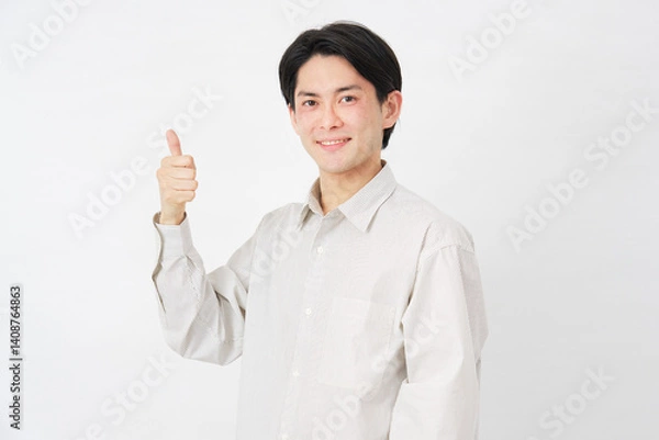 Obraz 男性　20代　グッドサイン　白背景