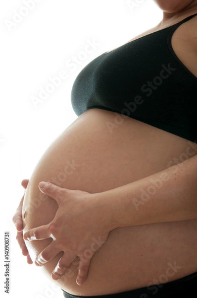 Obraz Pregnant Mother Holding Bare Belly Side On