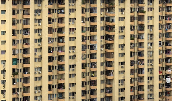 Fototapeta Close up view of a huge multi-storied apartment block building