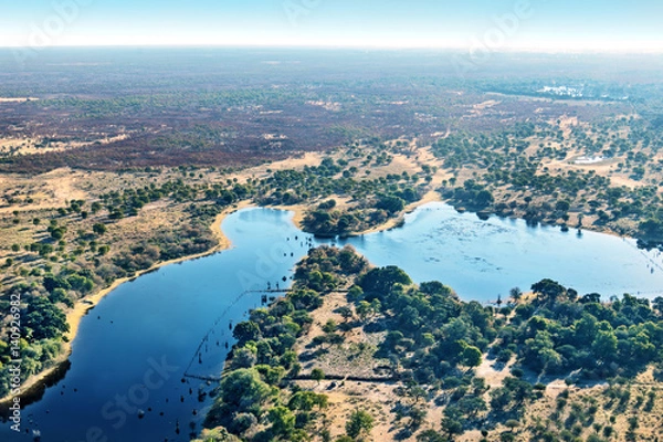 Fototapeta Okavango delta (Okavango Grassland) is one of the Seven Natural Wonders of Africa (view from the airplane) - Botswana