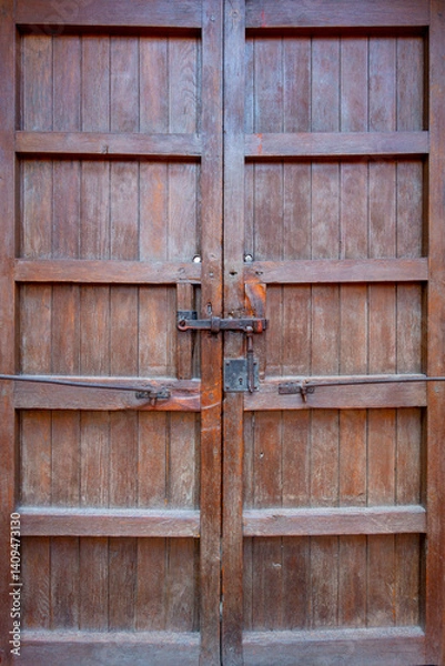 Fototapeta Wooden door close-up view with rusty