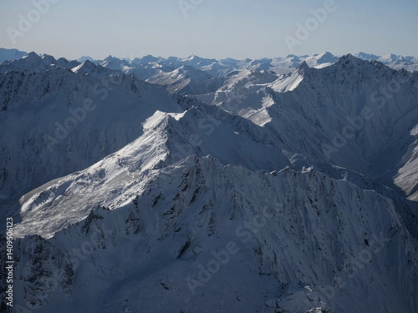 Fototapeta Aerial panorama view of alpine mountain layers landscape, white snow capped peaks of the Southern Alps, Otago Southland South Island New Zealand