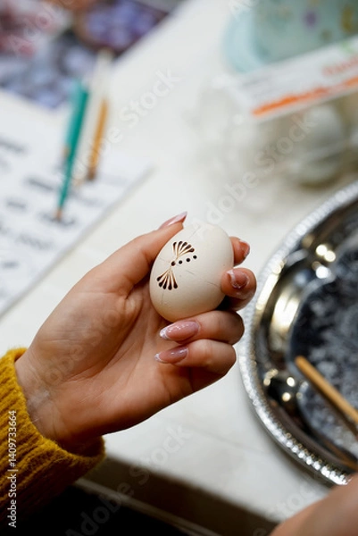 Obraz The process of painting Easter eggs, using bees wax as traditional Lithuanian method