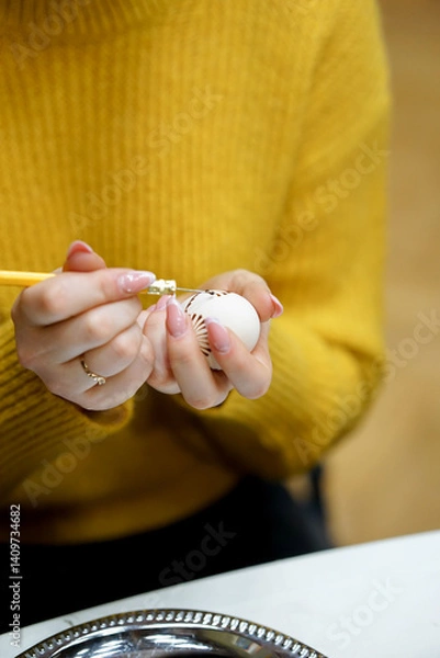 Obraz The process of painting Easter eggs, using bees wax as traditional Lithuanian method