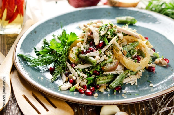 Obraz Salad with baked chicken fillet, green beans, quail eggs, grapes and pomegranate seeds