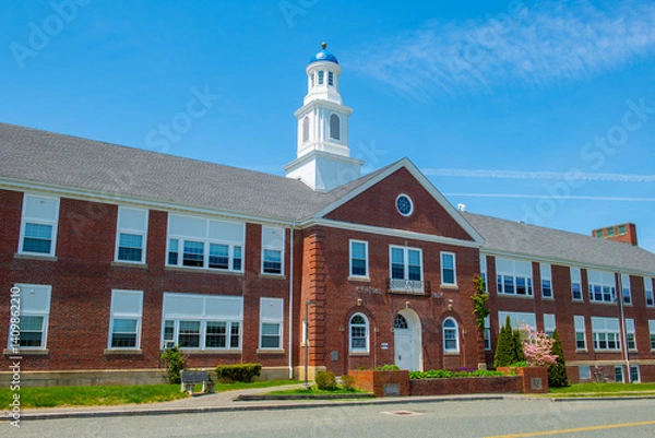 Fototapeta Central School building at Central Park in town center of Scituate, Massachusetts MA, USA. Now this building is Scituate Housing Authority. 