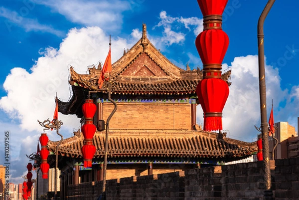 Obraz Traditional building and red lanterns on old wall in Xian, China