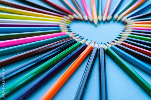 Fototapeta Abstract blur background. Crayon heart - Heart shape made of colored pencils